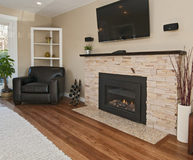 stone fireplace grey rug