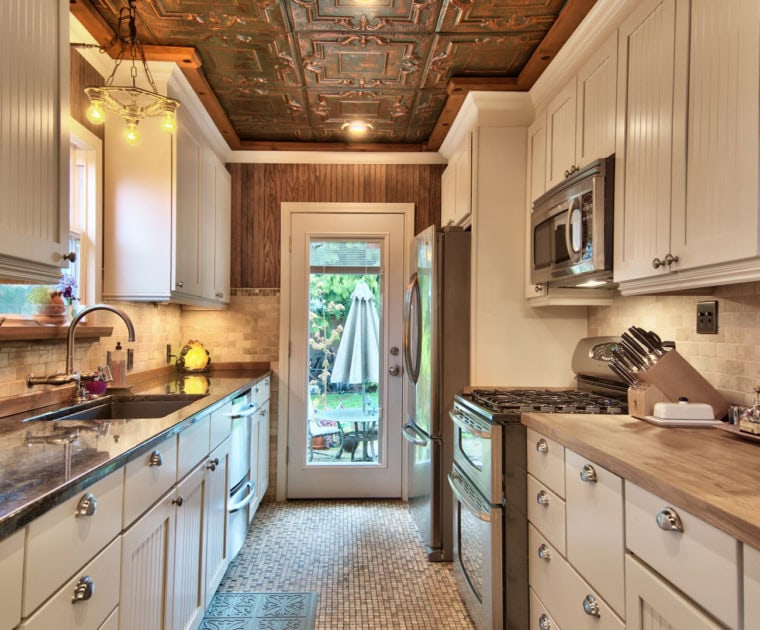long kitchen tile floor ornate copper ceiling